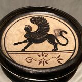 Cup decorated with winged sphinx in Ciboure sandstone signed Marie Fernandez