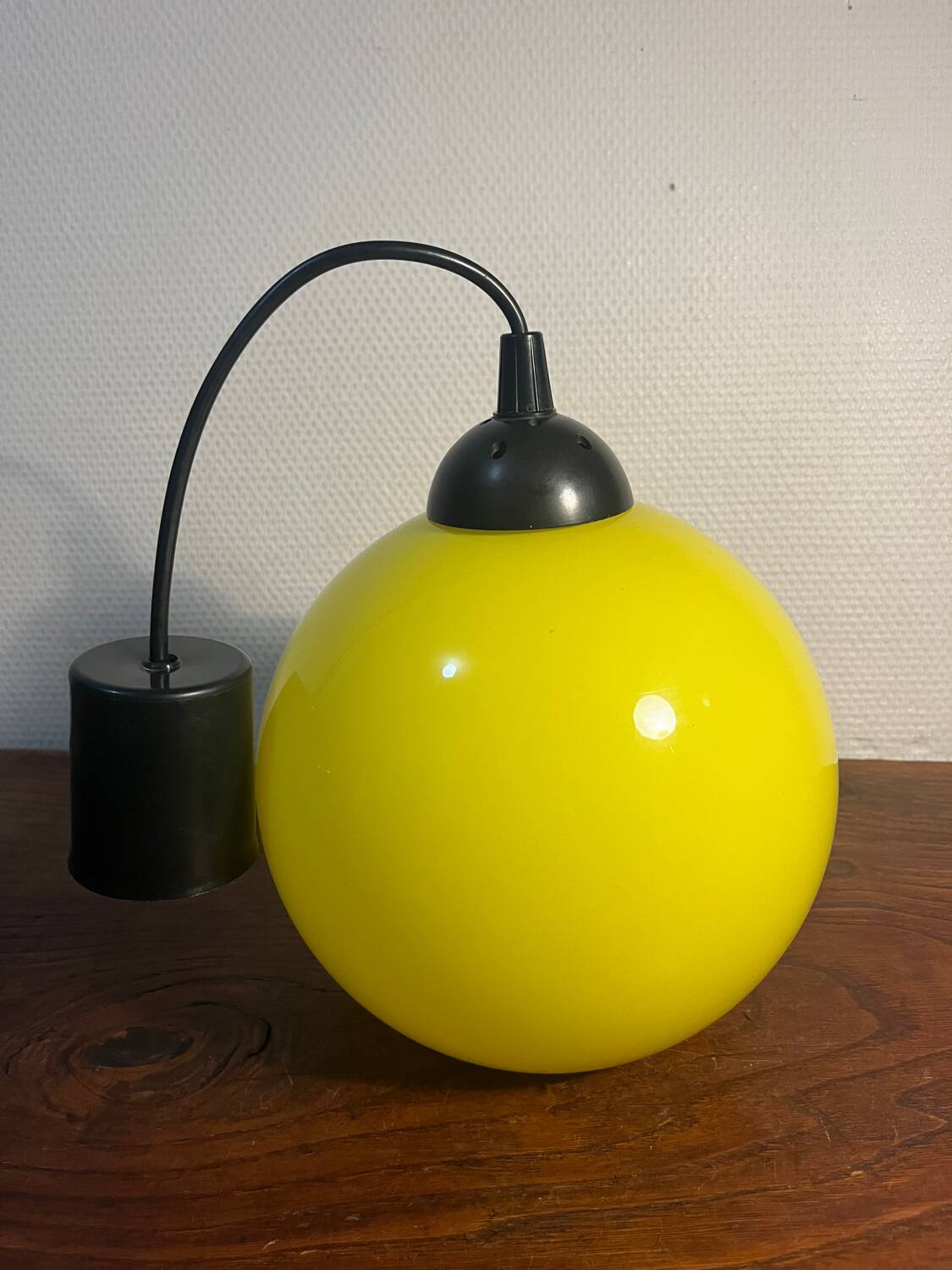Yellow opaline globe pendant light from the 70s
