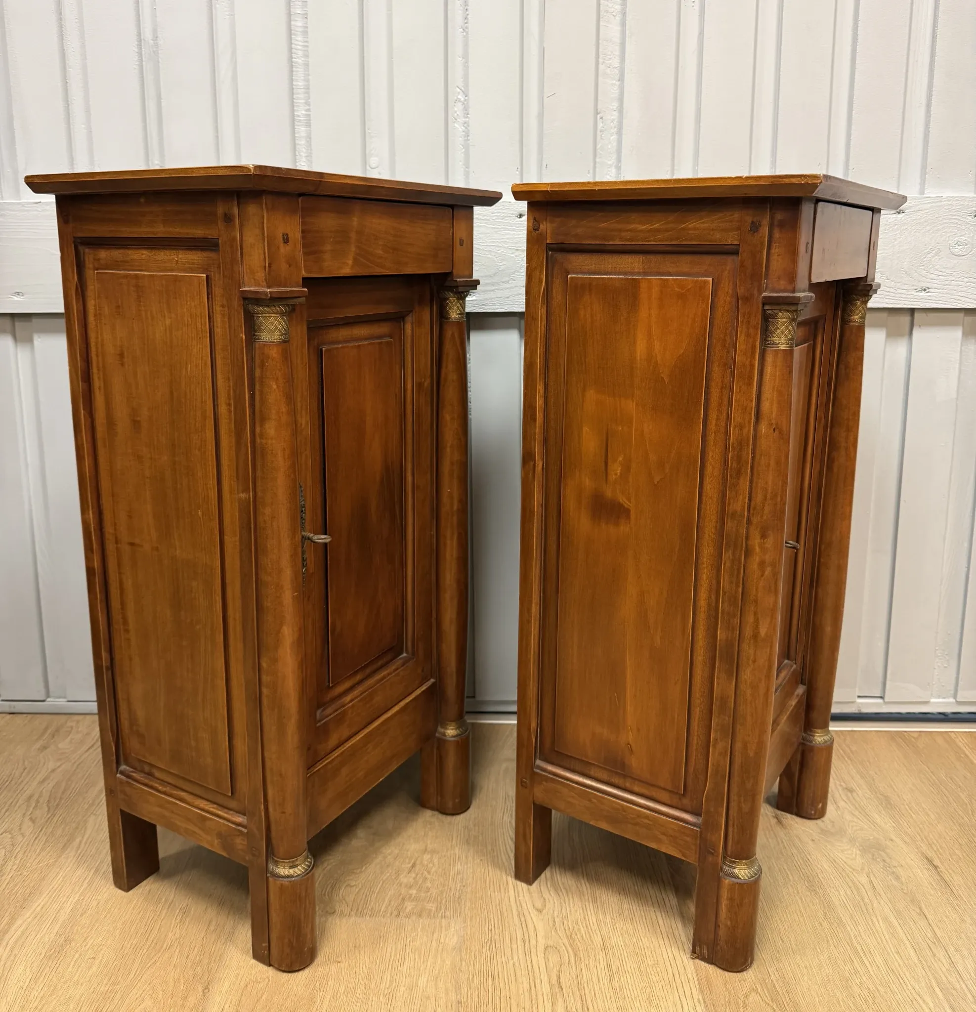Pair of Empire style bedside tables