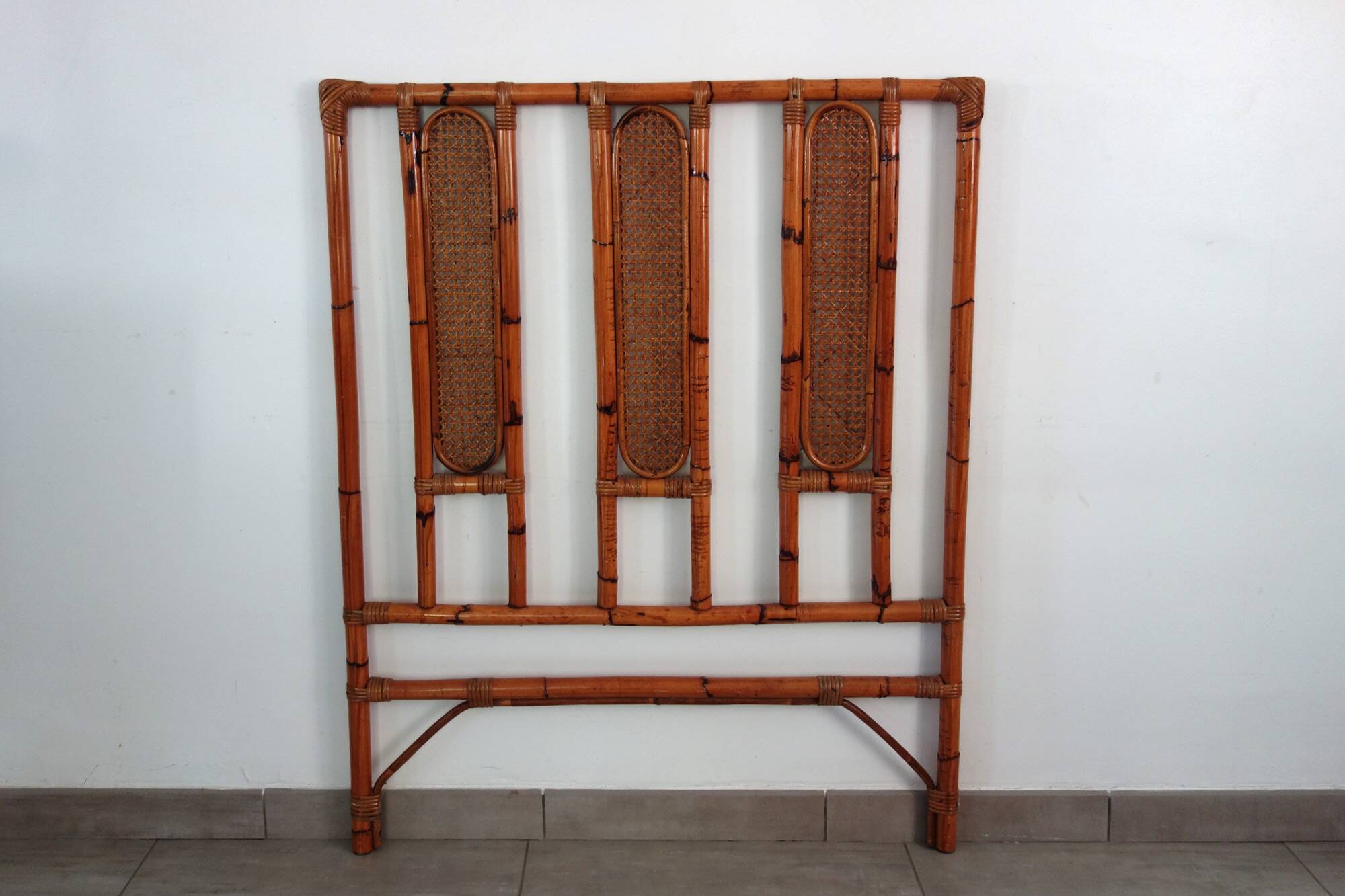 Bamboo and cane headboard from the 1970s.