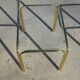 Nested table in gold metal and glass