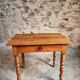 Small antique French writing table in walnut with a drawer, around 1900.