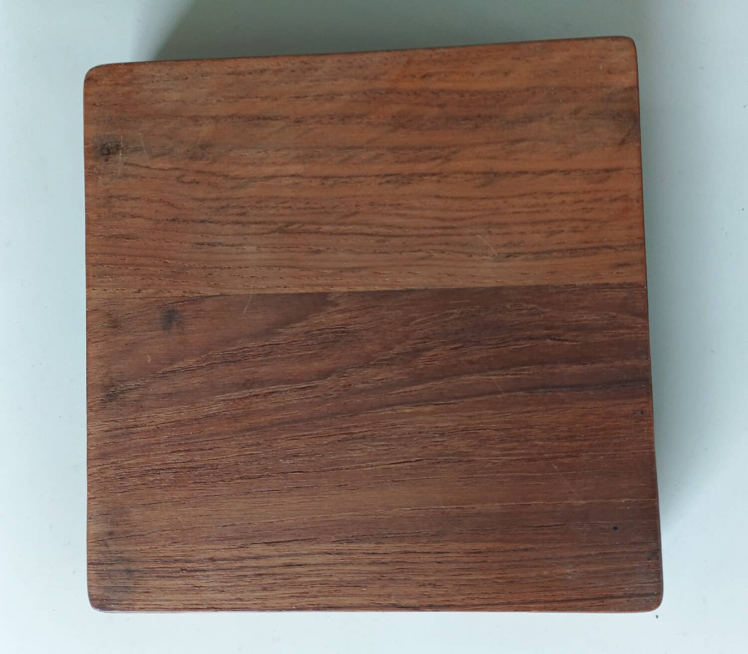 Stainless steel and wood pocket emptier