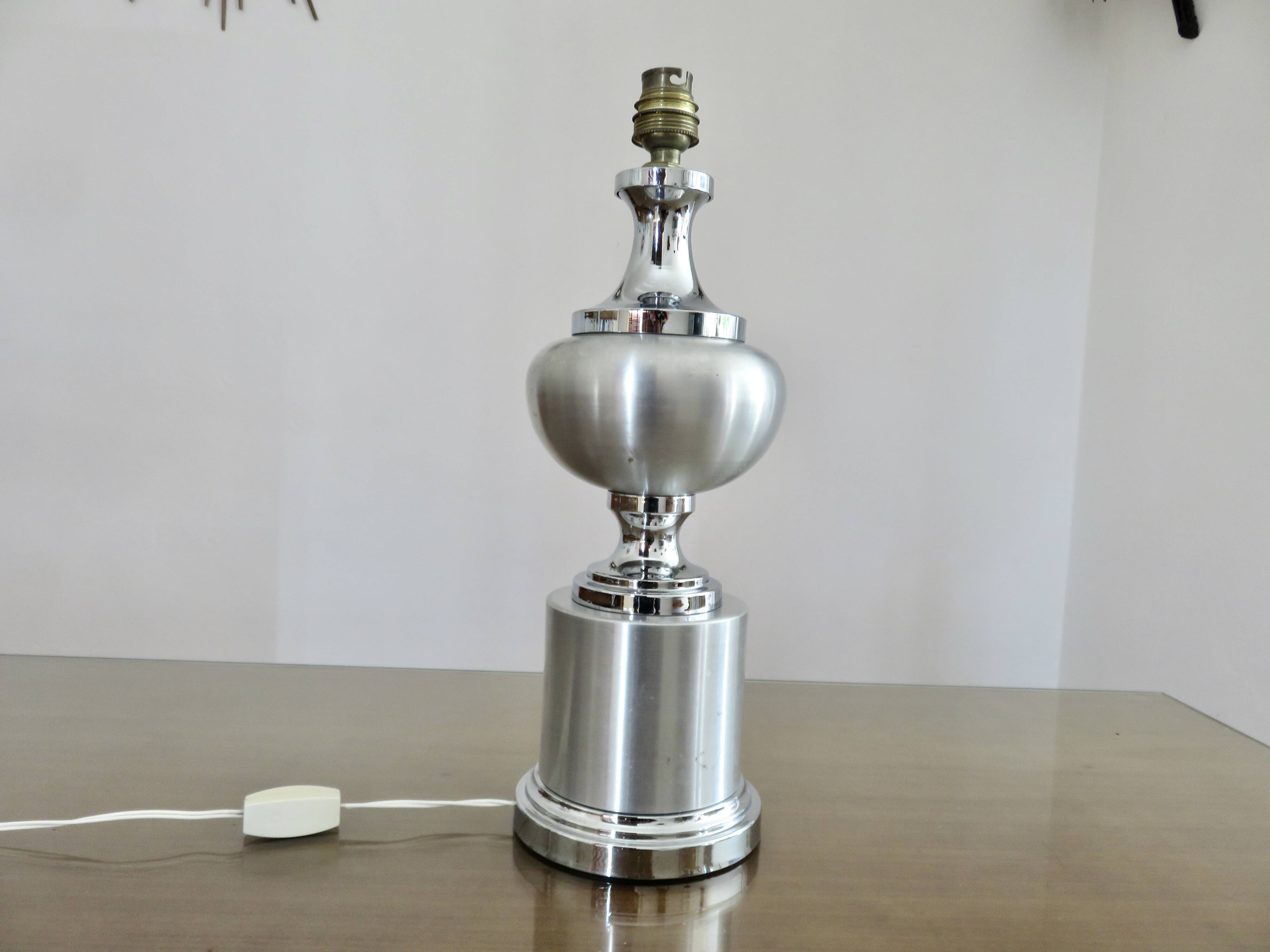 Brushed aluminum and chrome lamp typical of the 70s