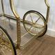 Rolling Table with Large Brass and Glass Wheels, Maison Jansen, Circa 1940
