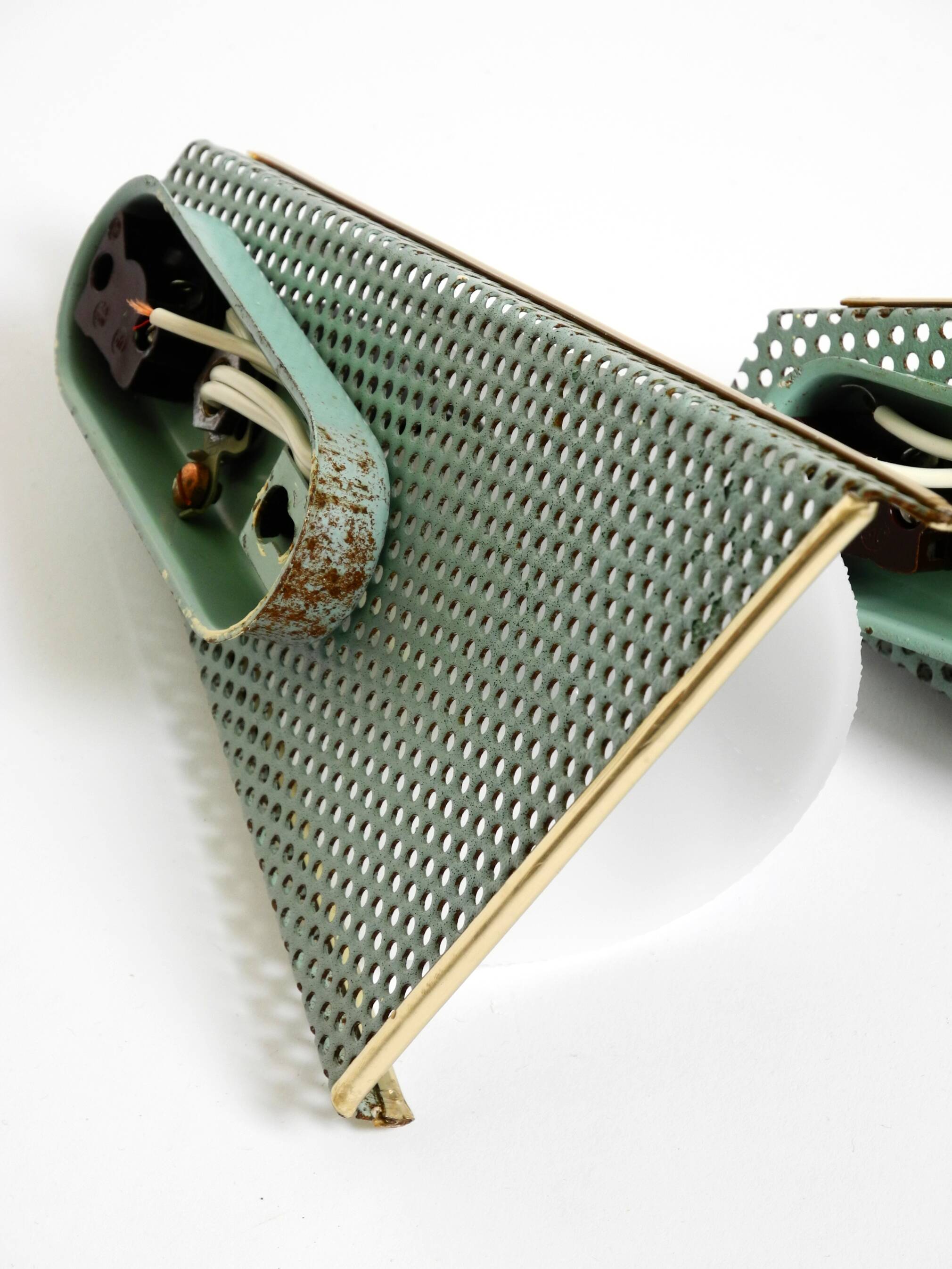 Pair of beautiful mint green Mid Century Modern perforated sheet metal wall