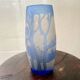 Transparent vase with a blue pattern featuring trees, signed MICHNA.
