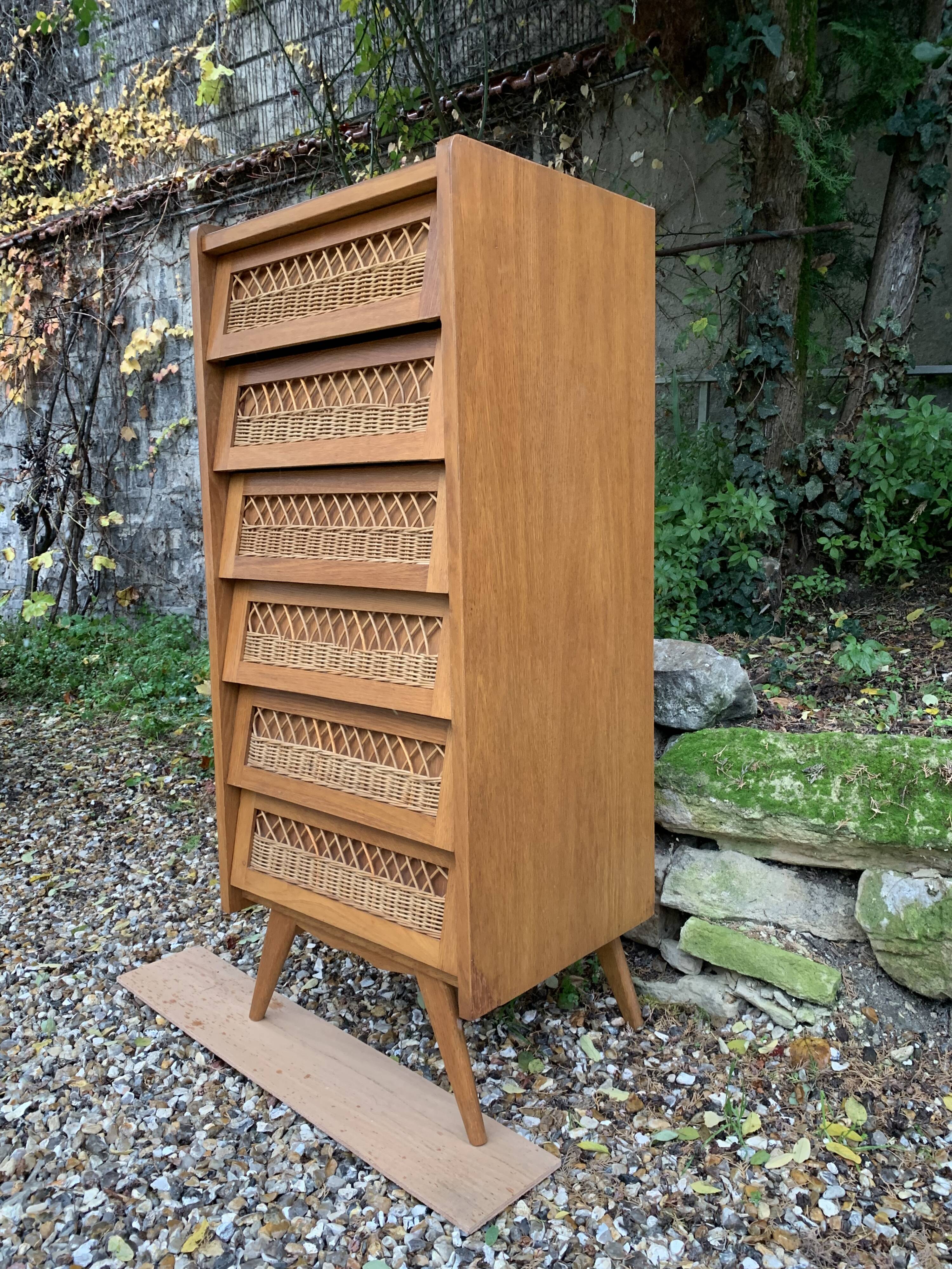 Vintage rattan chiffonier with compass feet 1950