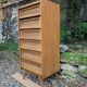 Vintage rattan chest of drawers with splayed legs from the 1950s.