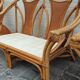 Set of 2 rattan armchairs with a bench.
