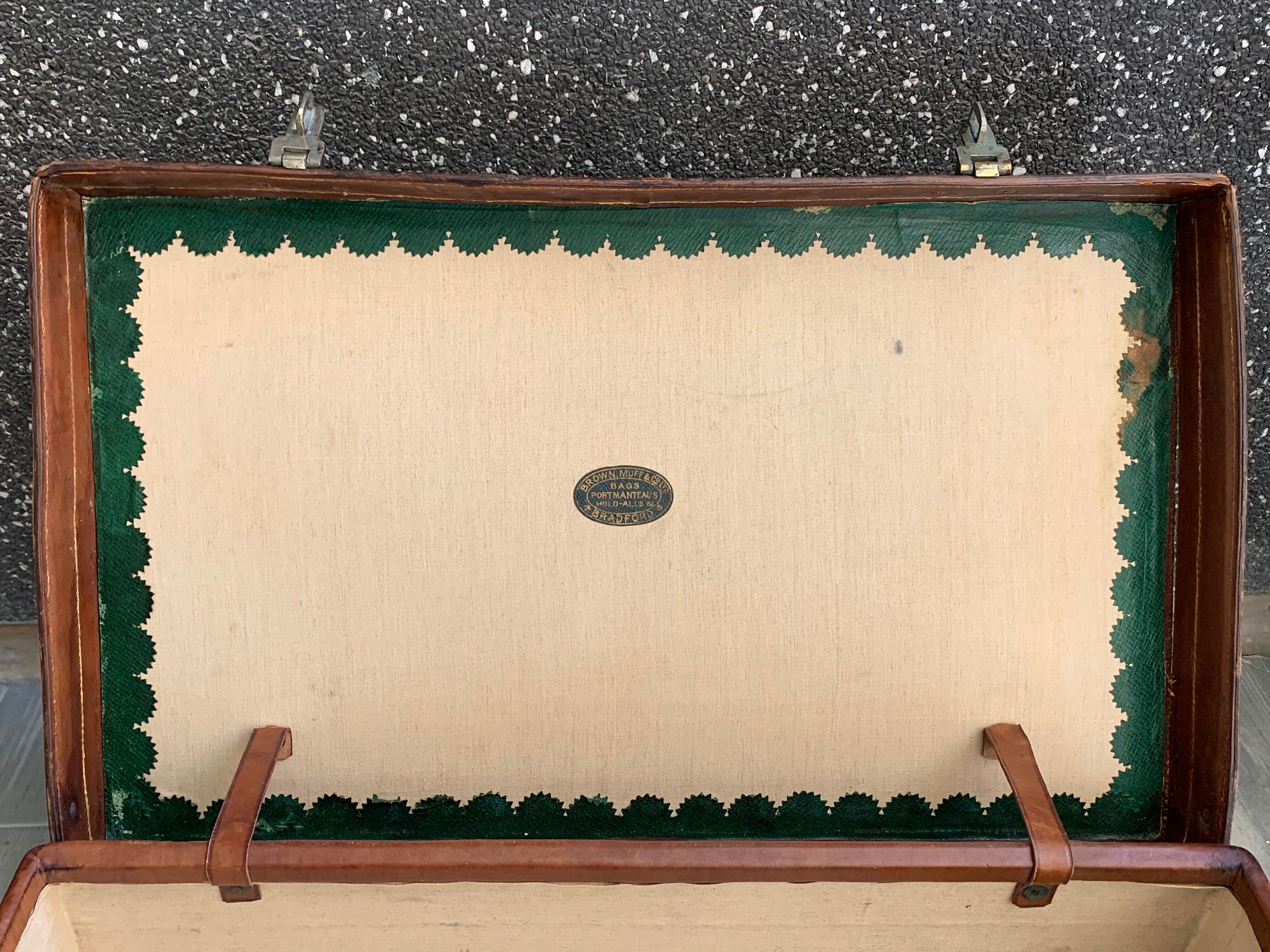 Rare old English suitcase stamped with the royal crown