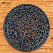 Black cast iron trivet in a chic country style.