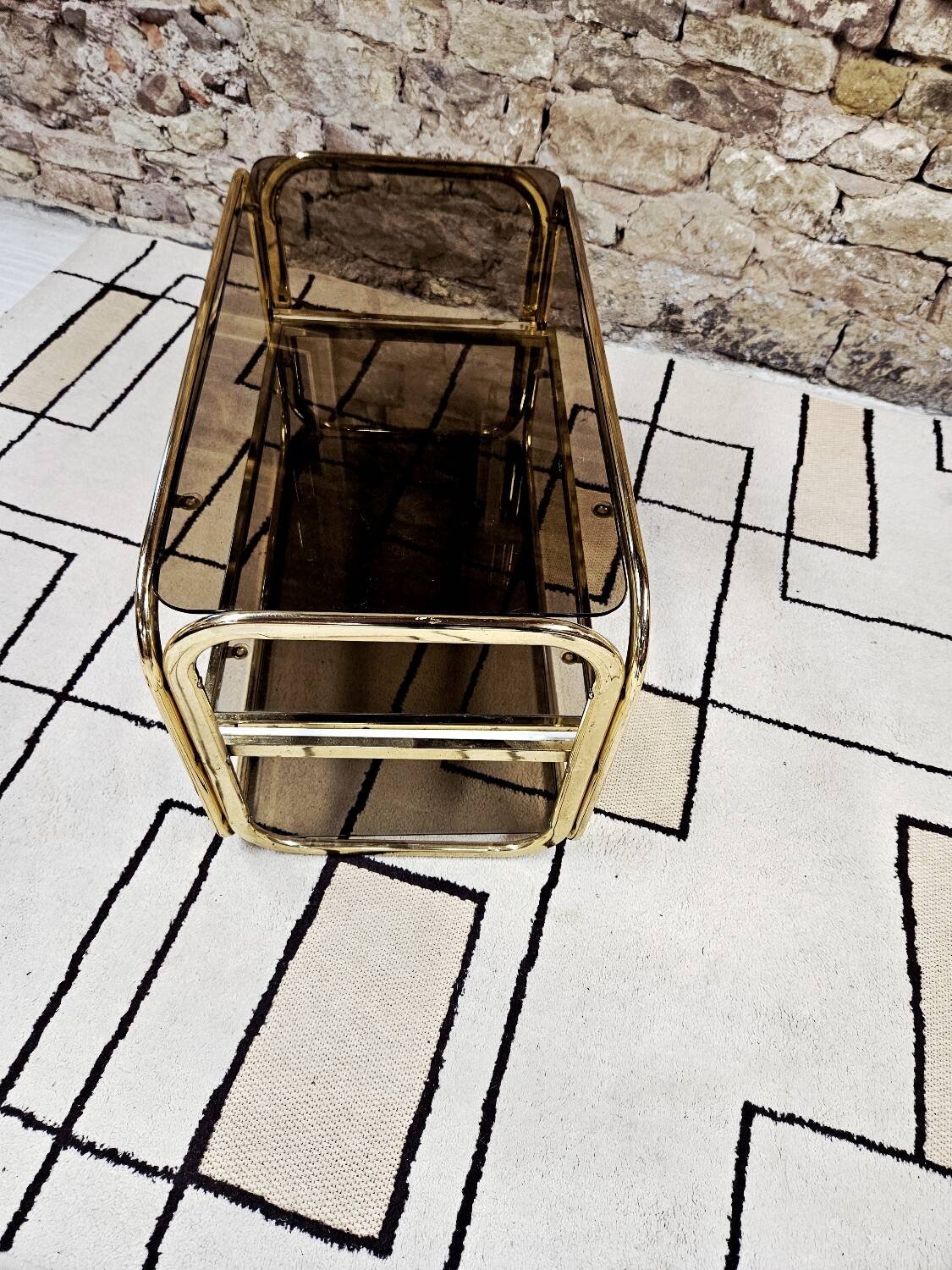 Brass coffee table with sliding top and smoked glass, 1970s vintage