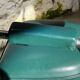 Pair of green vinyl and chrome armchairs, mid-century