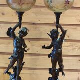 Pair of regulated kerosene lamps and marble