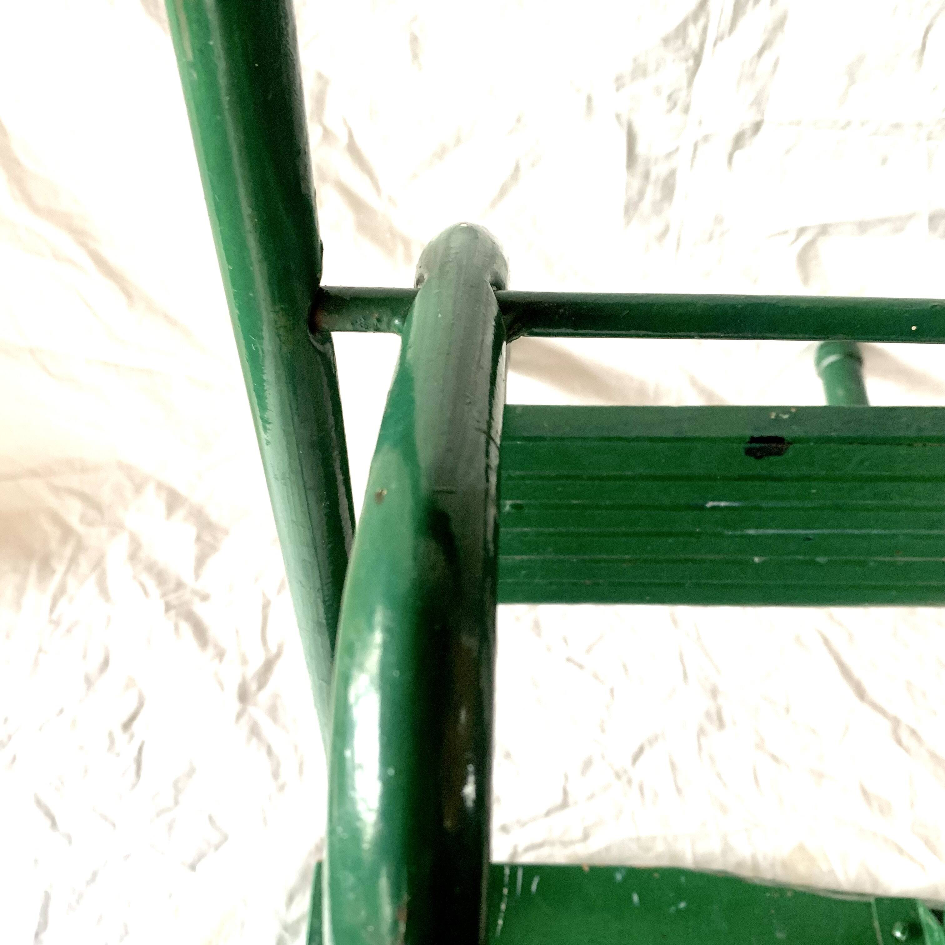 Vintage stepladder in green painted wood and steel