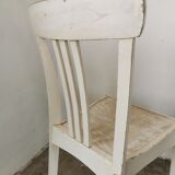 Set of 6 mismatched white chairs