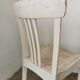 Set of 6 mismatched white chairs