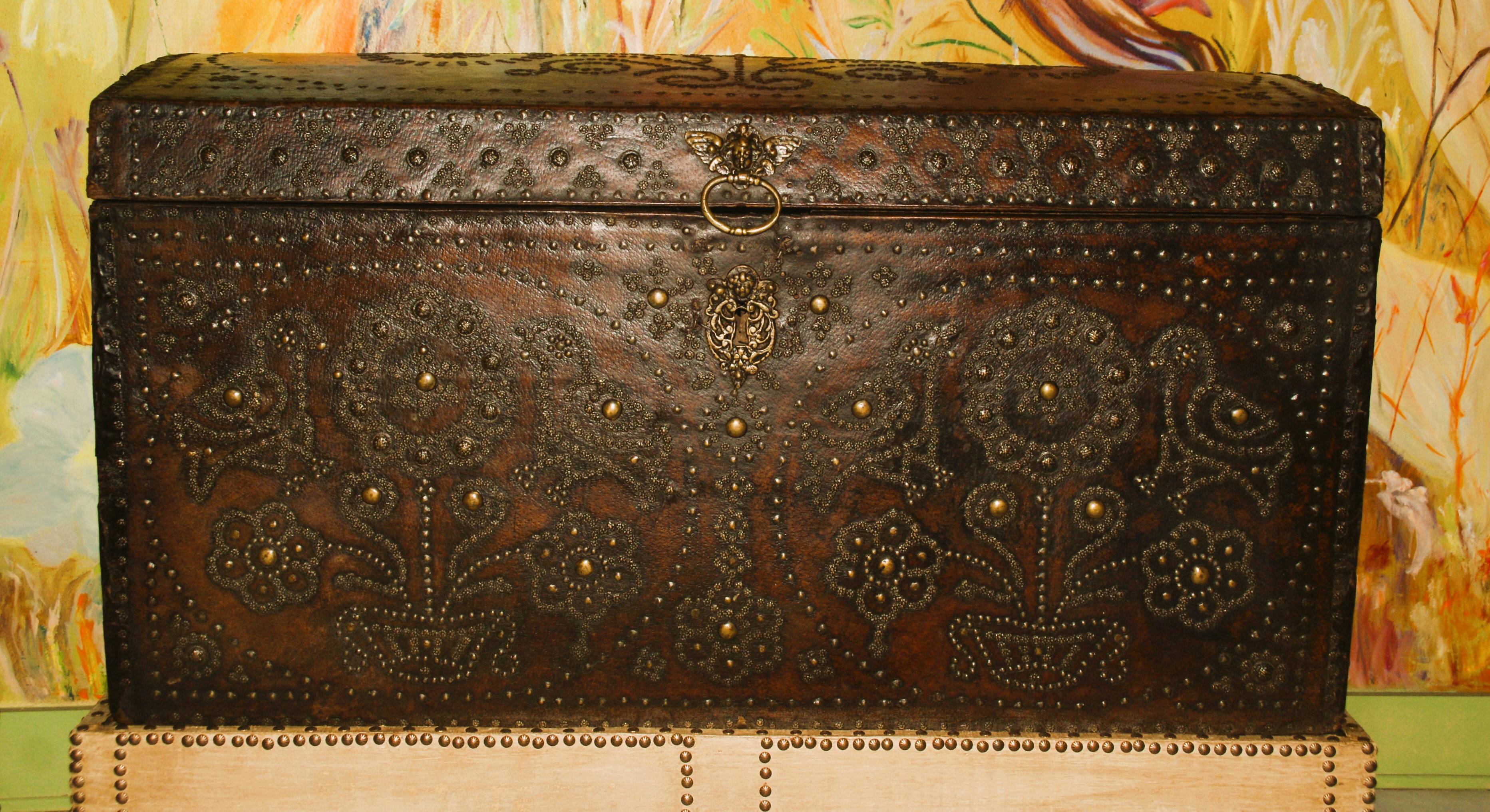 17th century studded leather travel trunk, richly decorated