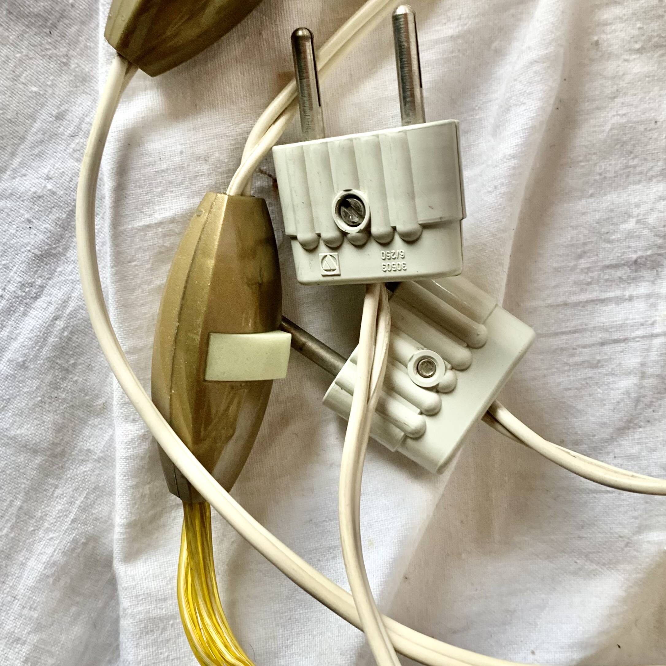 "Pair of vintage glass and brass wall sconces with tassels