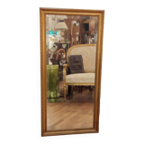 Old beveled mirror with gilded wood frame 20th century