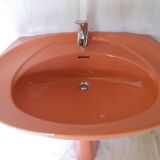 Vintage sink and its orange shelf