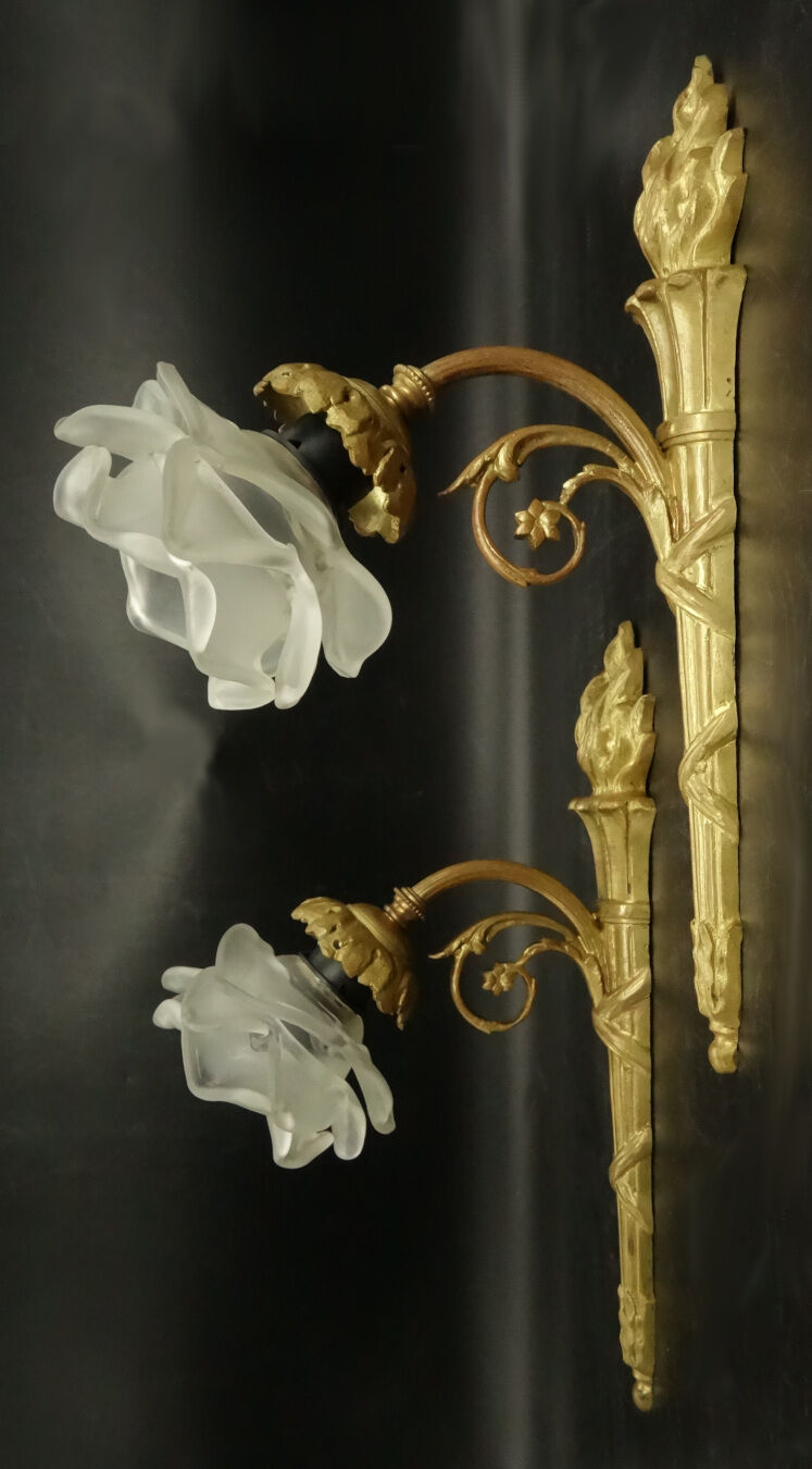 Pair of single-light wall sconces in the Louis XVI torch style - gilded bronze