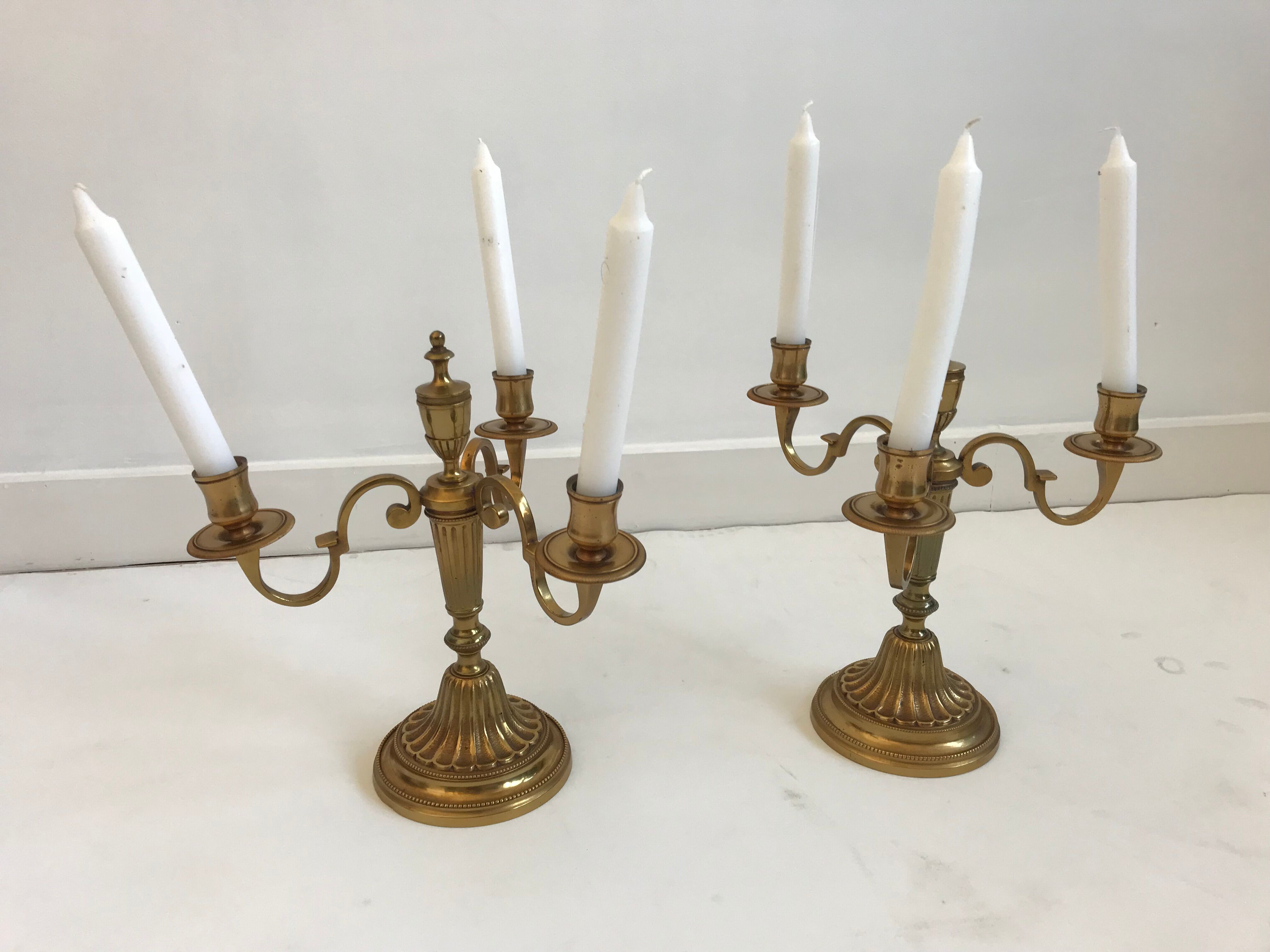 Pair of golden brass candlesticks
