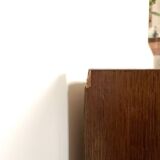 Vintage wooden chest of drawers with compass feet