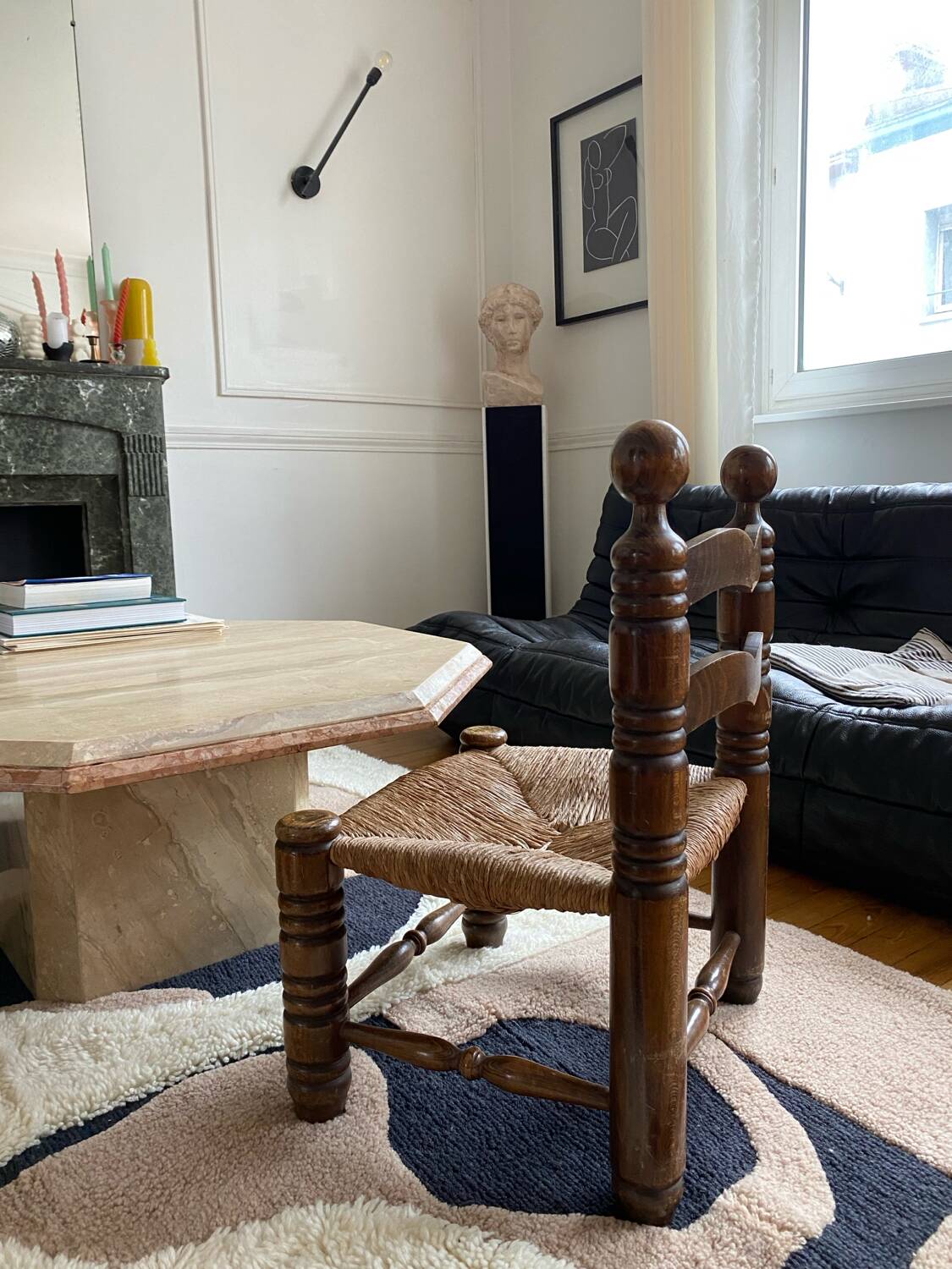 Low fireplace chair in the style of Charles Dudouyt