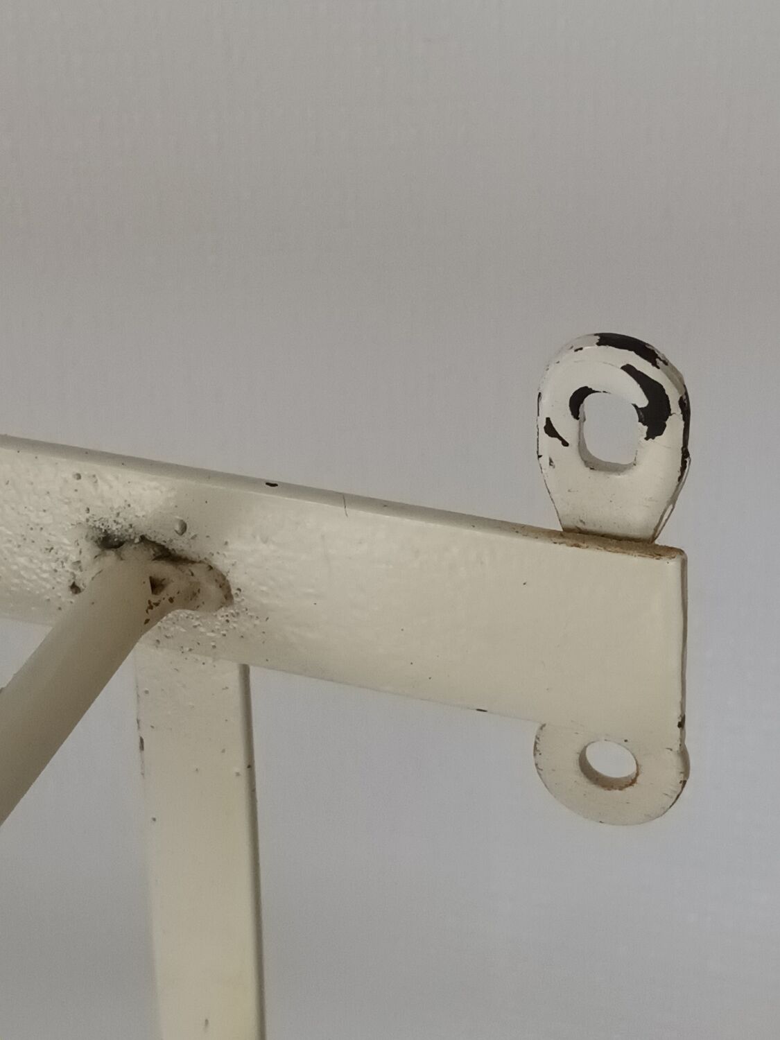 Vintage wrought iron wall coat rack