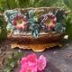 Antique jardinière in barbotine attributed to Onnaing with a floral motif.