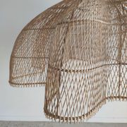 Huge rattan suspension in the shape of a corolla H:1m; D: 1m50