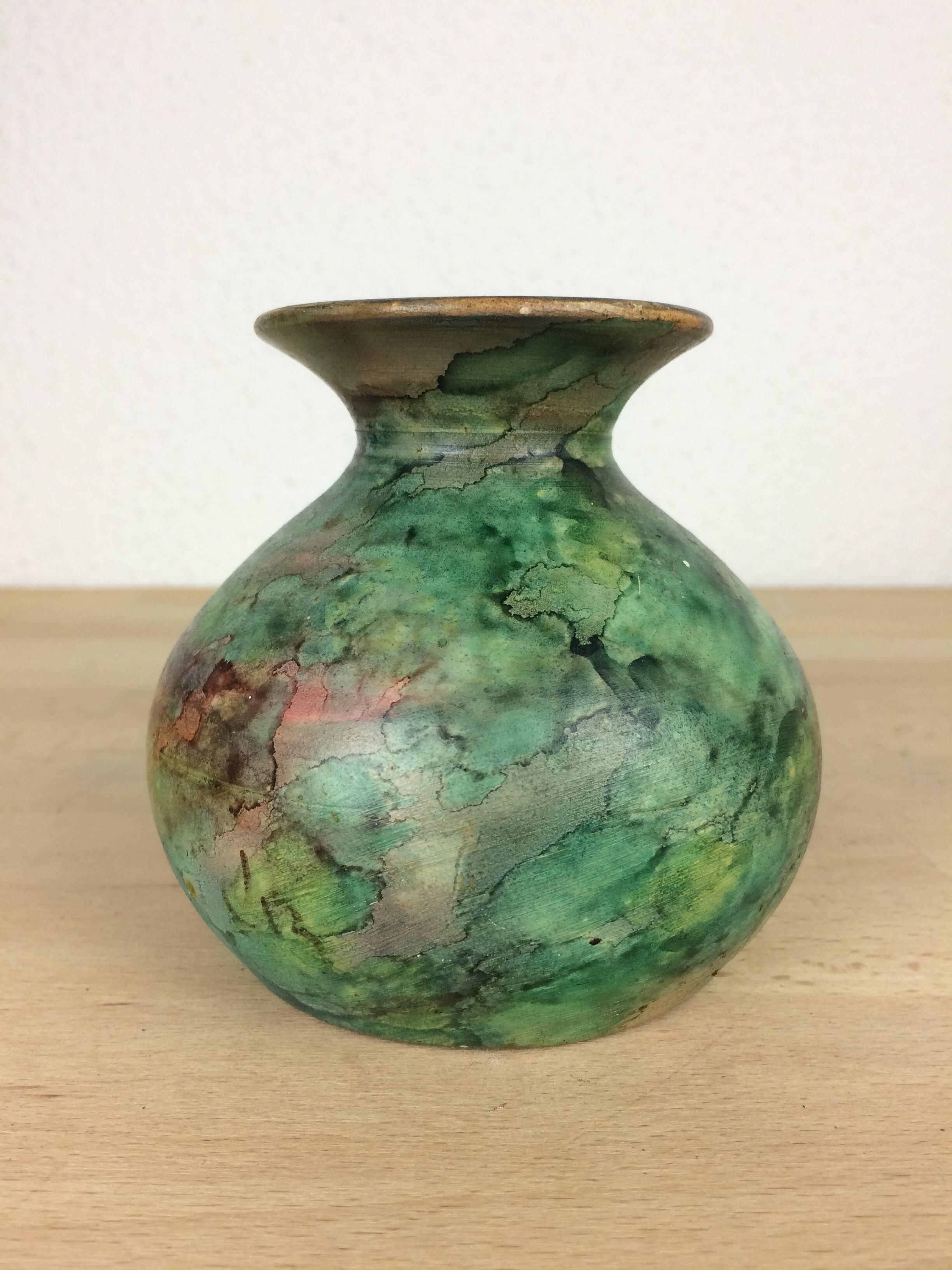 Vintage green ceramic ball vase