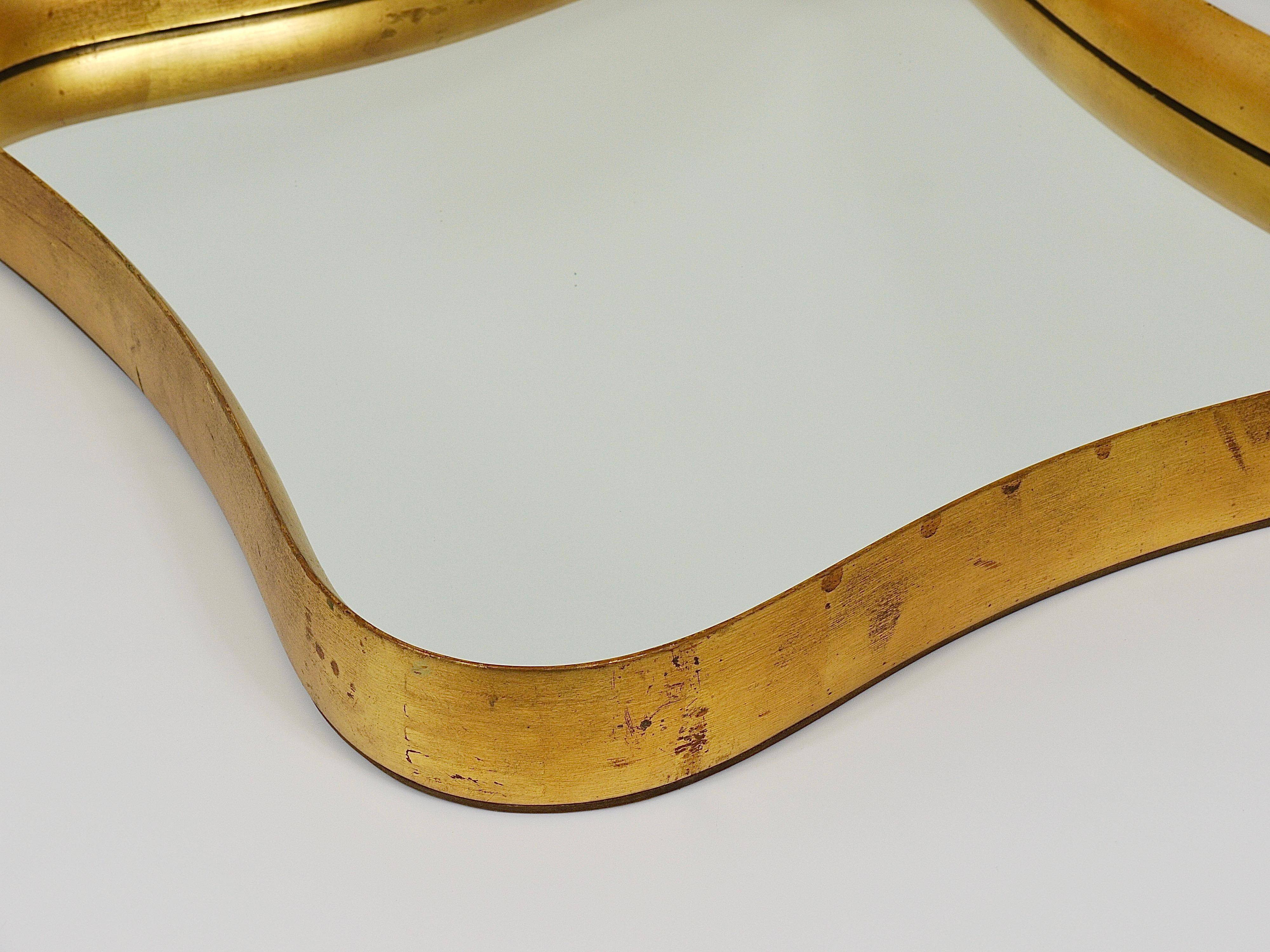 Golden wooden mirror in the style of Gio Ponti by Max Welz, Vienna, Austria, 1940s.