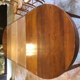 Solid oak table with 3 extension cords, 6 oak chairs with straw seat
