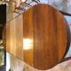 Solid oak table with 3 extension cords, 6 oak chairs with straw seat