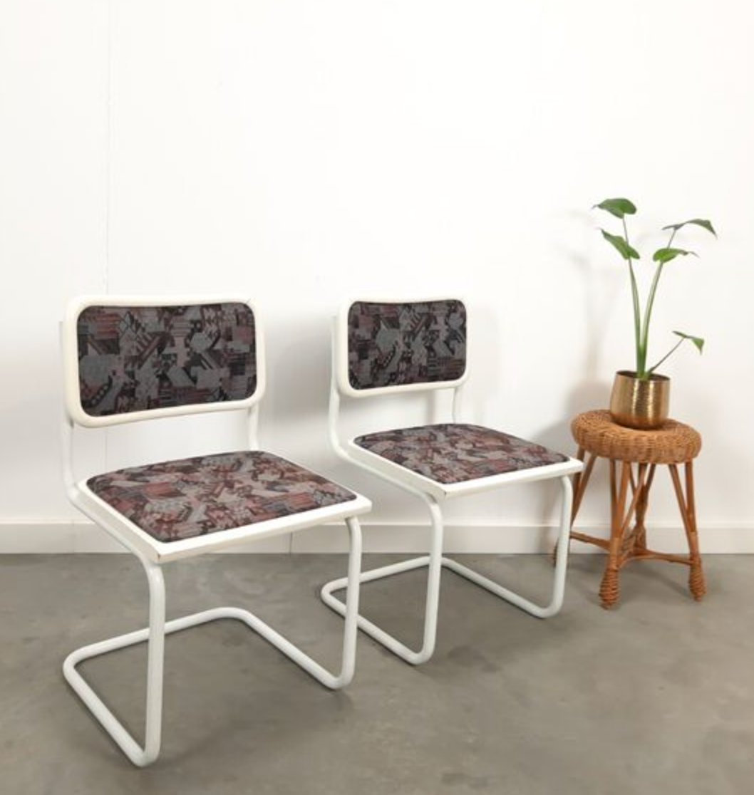 Pair of vintage tubular frame dining chairs