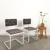 Pair of vintage tubular frame dining chairs