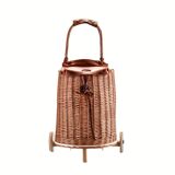 Wicker basket on wheels with leather flap