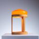 Bent oak wood table lamp with orange glass shade