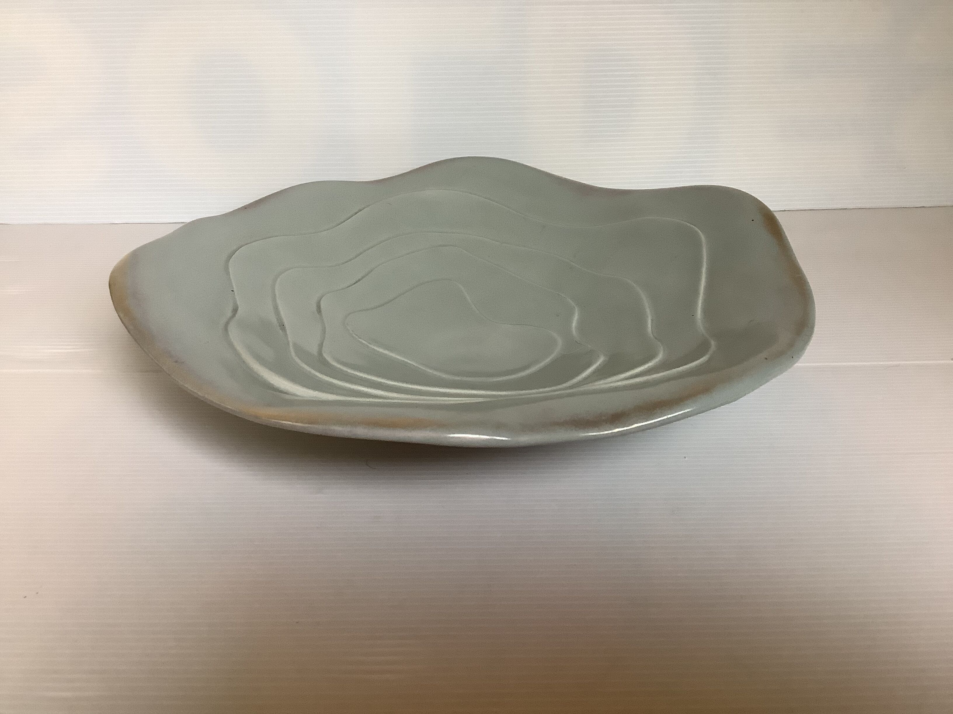 Grey-green ceramic cup