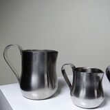 Set of 4 vintage bar measures in brushed stainless steel from the 60s-70s.