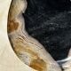 Empty pocket or dish in medium petrified wood