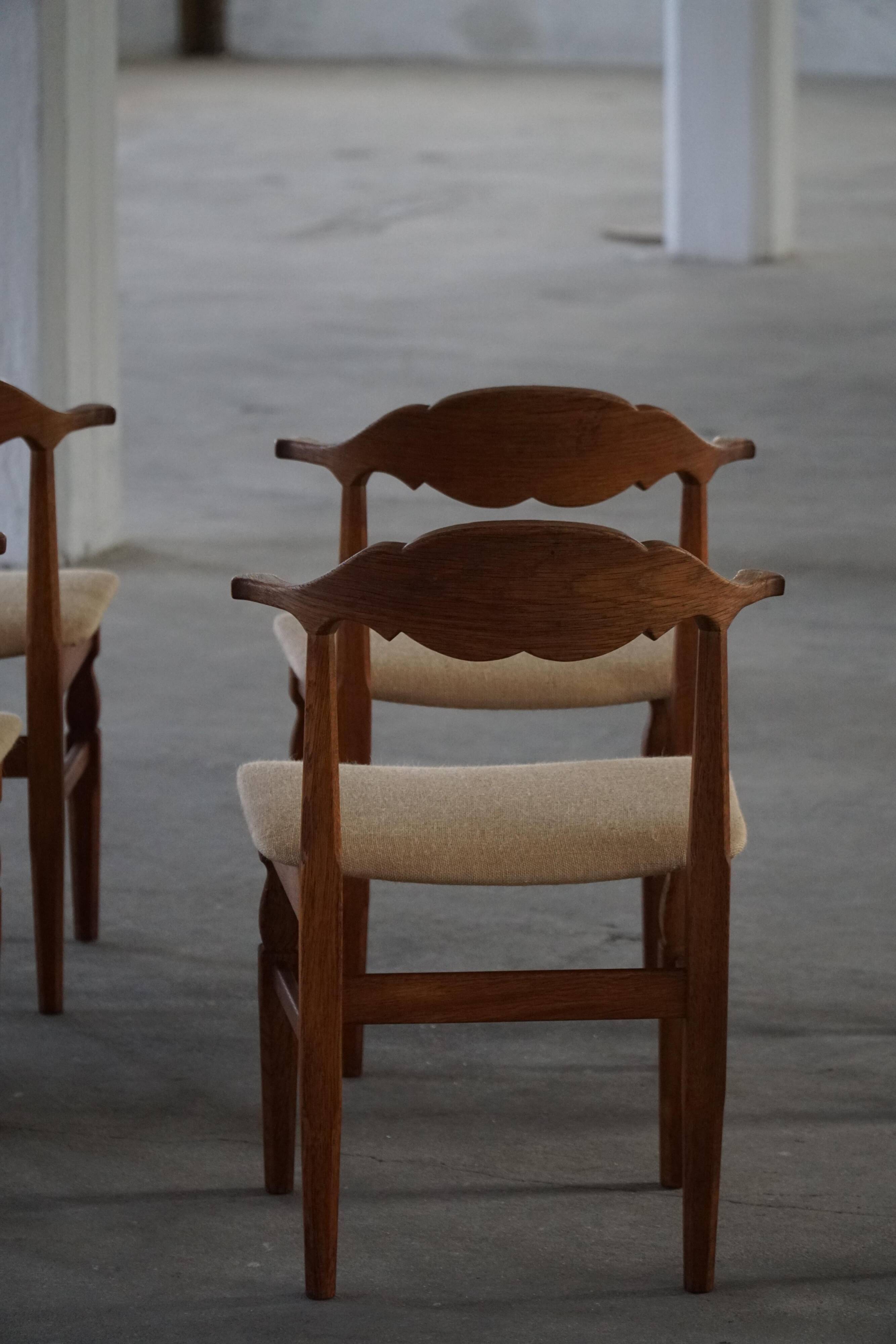 Henning Kjærnulf, set of 8 oak chairs with jute fabric, mid-century Danish, 1960s.