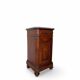 A pair of antique walnut bedside tables from the 1890s.