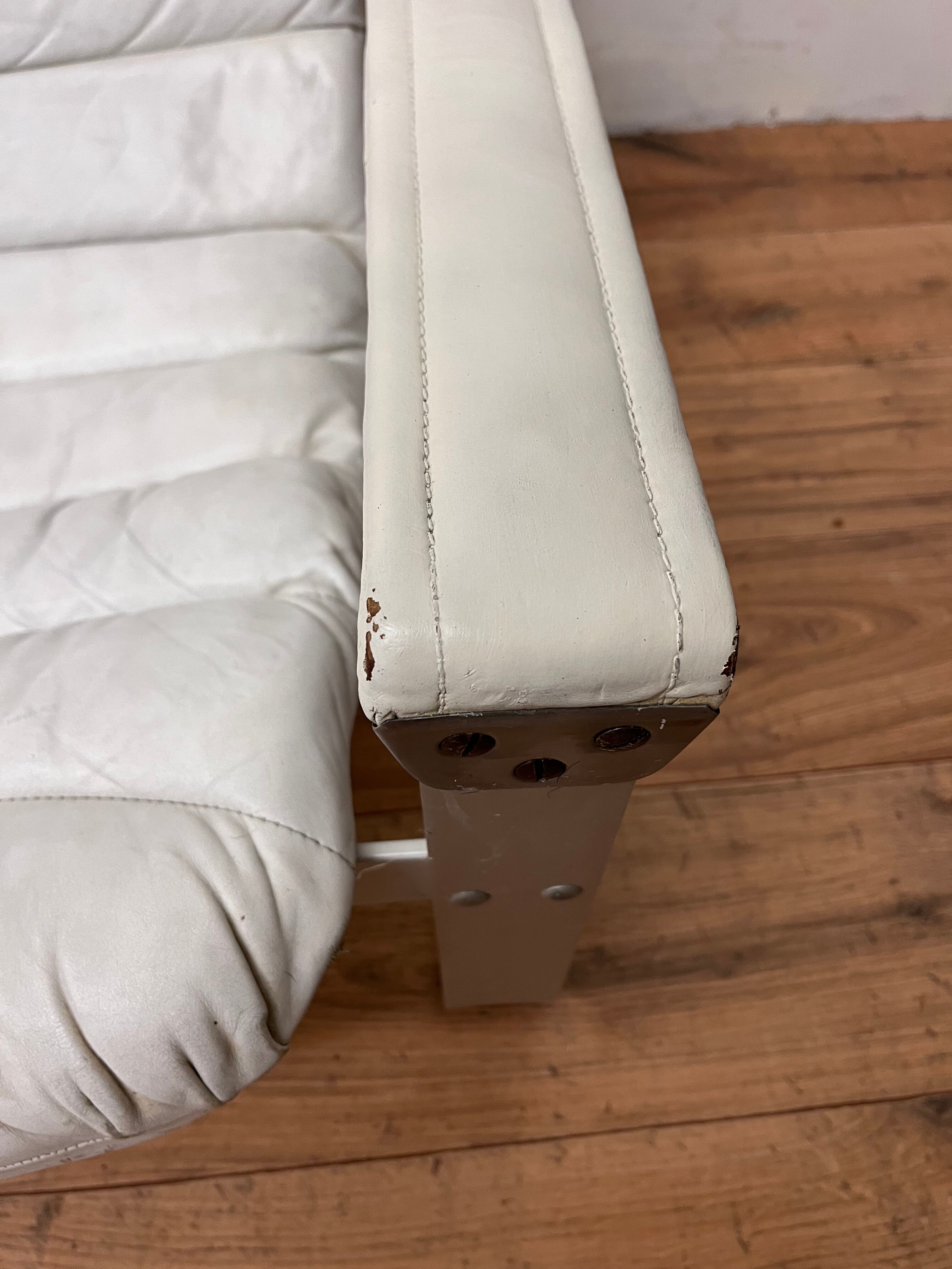 Pulkka armchair by Ilmaria Lappalainen and its ottoman