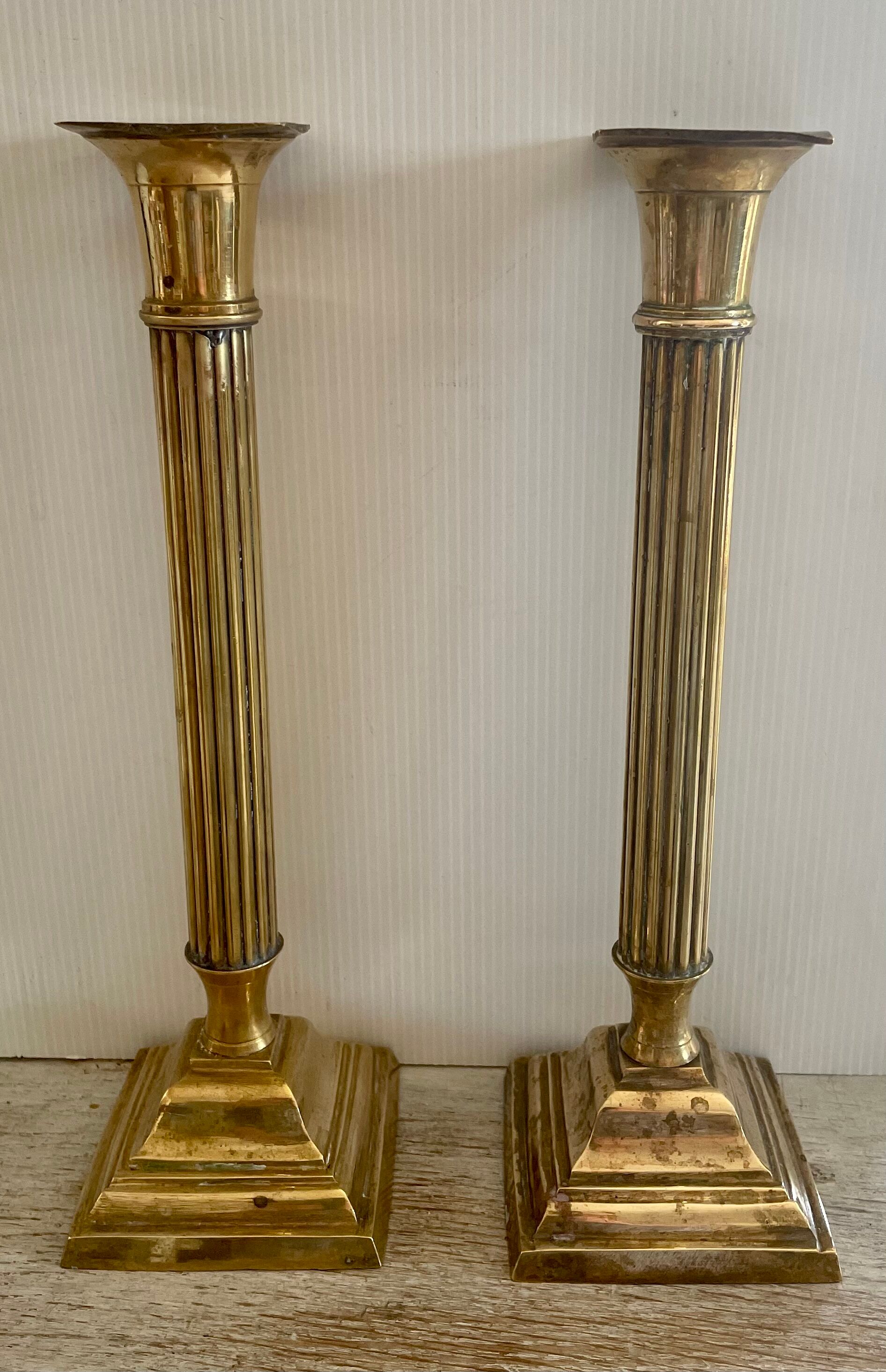 Payroll of brass column candle holders