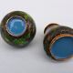 Salt and pepper shaker in partitioned enamels