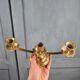 Vintage brass candle holder with 3 lights, flower drip trays, ideal for a centrepiece.